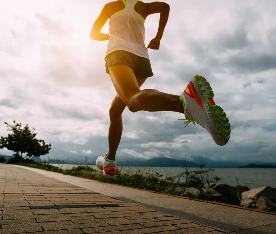 Runner mid-stride showing lower leg load associated with bone stress injuries