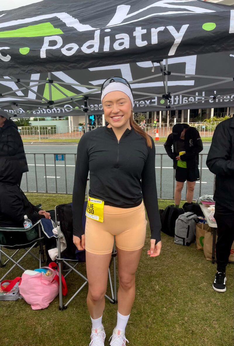 Ellie preparing for a running event during her fibromyalgia recovery and training journey